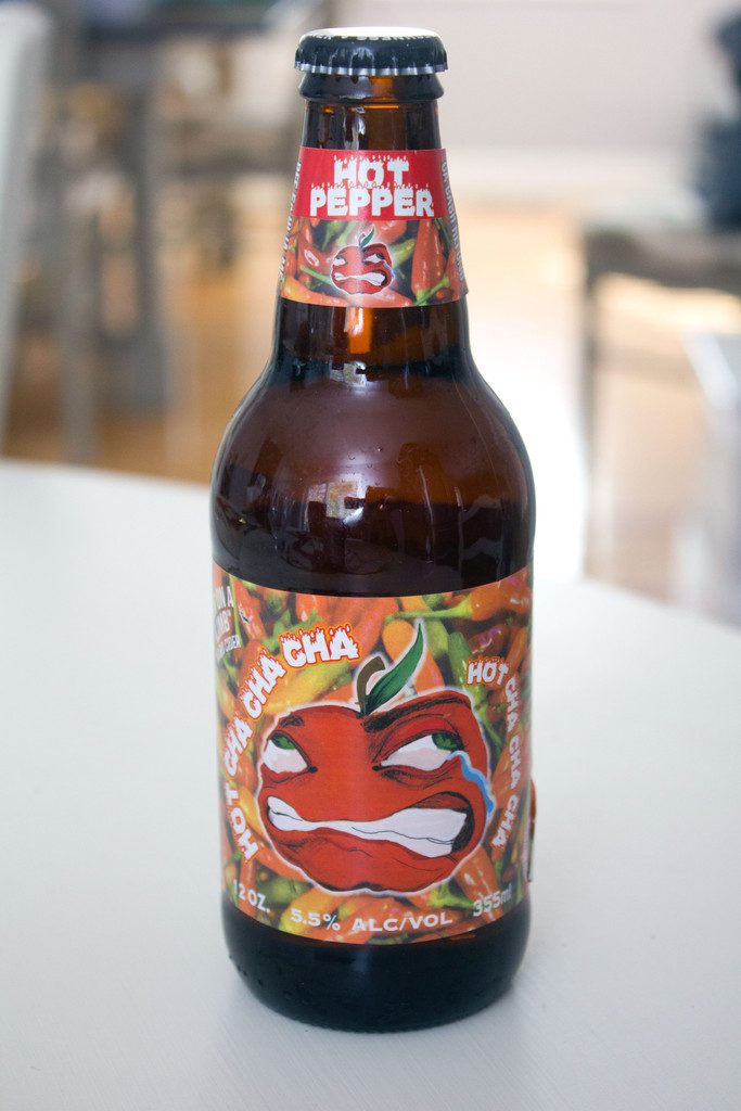 Head-on view of a bottle of Hot Pepper Hard Cider