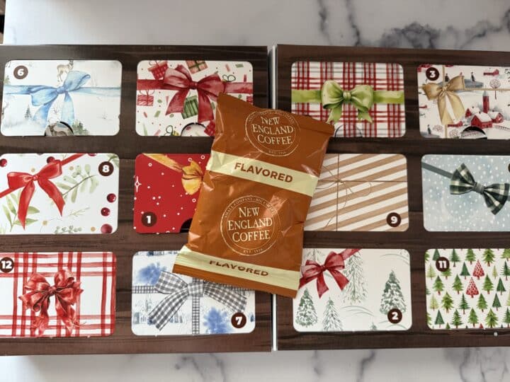 Inside of the New England Coffee advent calendar featuring 12 days of coffee.