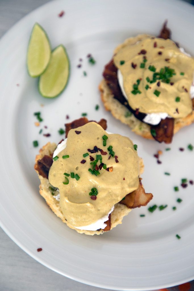 Jalapeño Biscuit Eggs Benedict with Avocado Lime Hollandaise -- The best brunch ever | wearenotmartha.com