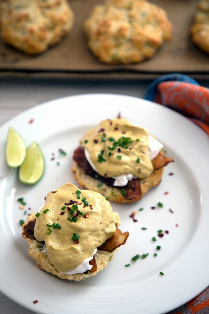 Jalapeño Biscuit Eggs Benedict with Avocado Lime Hollandaise -- The best brunch ever | wearenotmartha.com