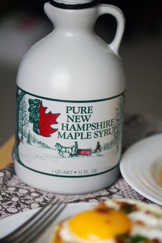 An up close view of a bottle of "Pure New Hampshire Maple Syrup"