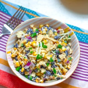 Jalapeño Cheddar Corn Salad -- This Jalapeño Cheddar Corn Salad mixes charred corn, black beans, red onion, jalapeño, and cheddar cheese tossed with Jalapeño Cheddar Heluva Good! Dip for a fabulous summer salad that's always a crowd-pleaser | wearenotmartha.com
