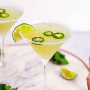 Jalapeño Parsley Sour Martini -- This Jalapeño Parsley Sour Martini brings a little bit of heat, a little bit of sweet, and a little bit of sour and is the ultimate jalapeño vodka martini. | wearenotmartha.com