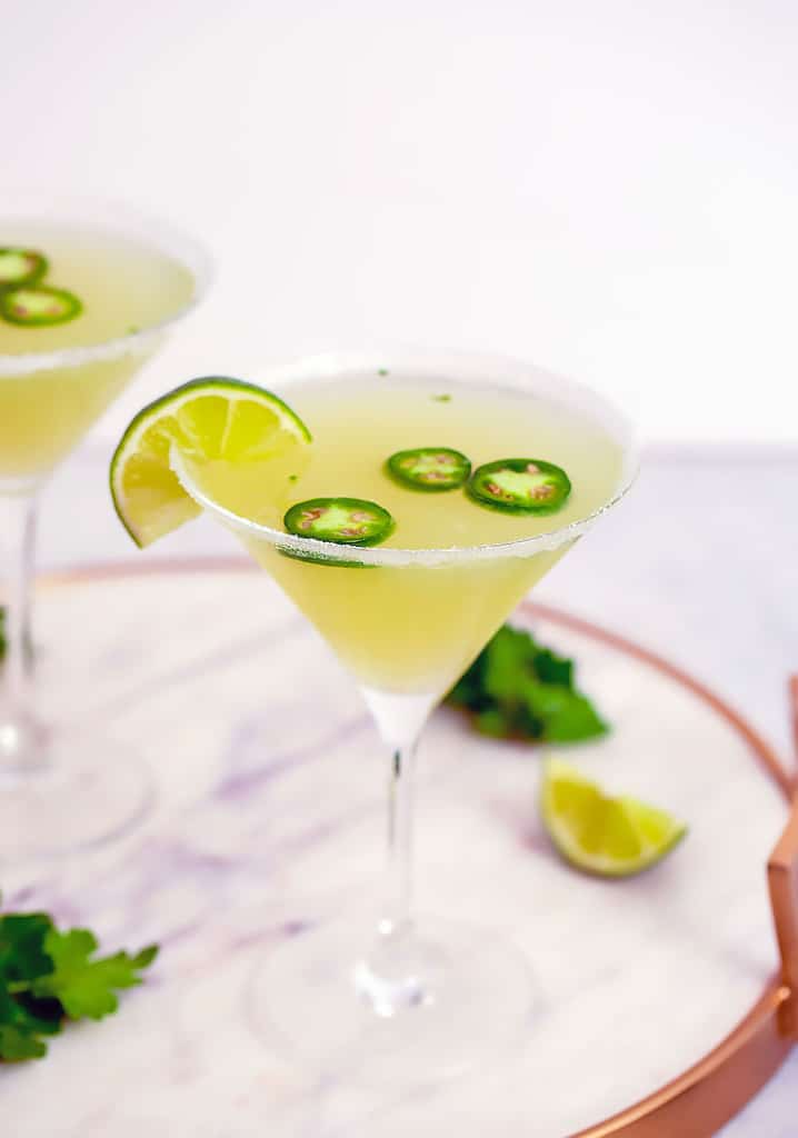 Jalapeño Parsley Sour Martini -- This Jalapeño Parsley Sour Martini brings a little bit of heat, a little bit of sweet, and a little bit of sour and is the ultimate jalapeño vodka martini. | wearenotmartha.com