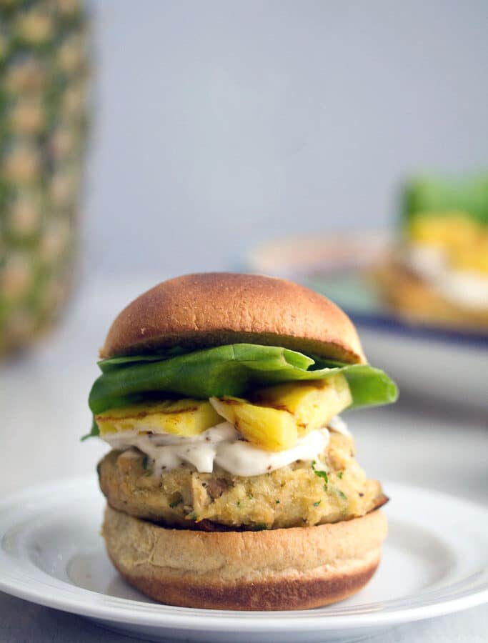 Jalapeño Tuna Burgers with Grilled Pineapple and Lemon Mayo -- Canned tuna doesn't have to mean boring old tuna sandwiches. This recipe for tropical-style Jalapeño Tuna Burgers with Grilled Pineapple and Lemon Mayo is likely to become a summertime staple | wearenotmartha.com