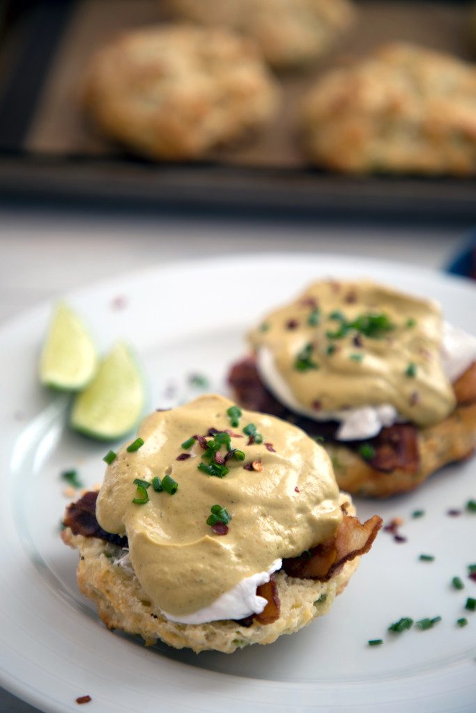 Jalapeño Biscuit Eggs Benedict with Avocado Lime Hollandaise -- The best brunch ever | wearenotmartha.com