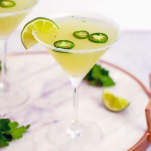 Jalapeño Parsley Sour Martini -- This Jalapeño Parsley Sour Martini brings a little bit of heat, a little bit of sweet, and a little bit of sour and is the ultimate jalapeño vodka martini | wearenotmartha.com