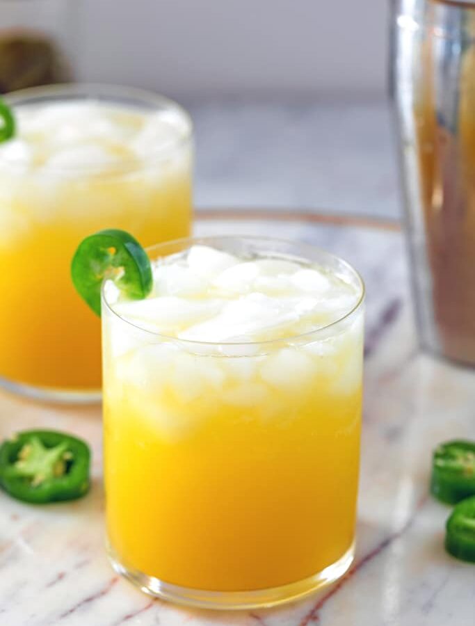Jalapeño Orange Spritzer -- This Jalapeño Orange Spritzer is a perfectly refreshing cocktail with a nice little kick thanks to the jalapeño infused vodka. But don't worry; the level of spiciness can be easily controlled! | wearenotmartha.com