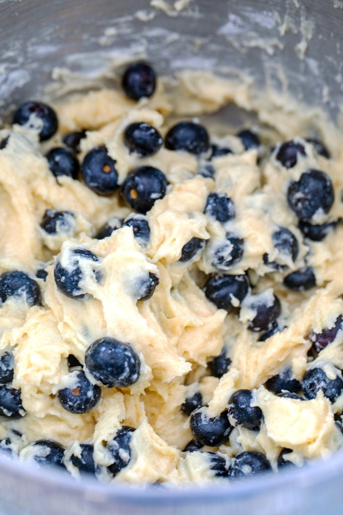 Overhead view of Jordan Marsh blueberry muffin batter in mixing bowl