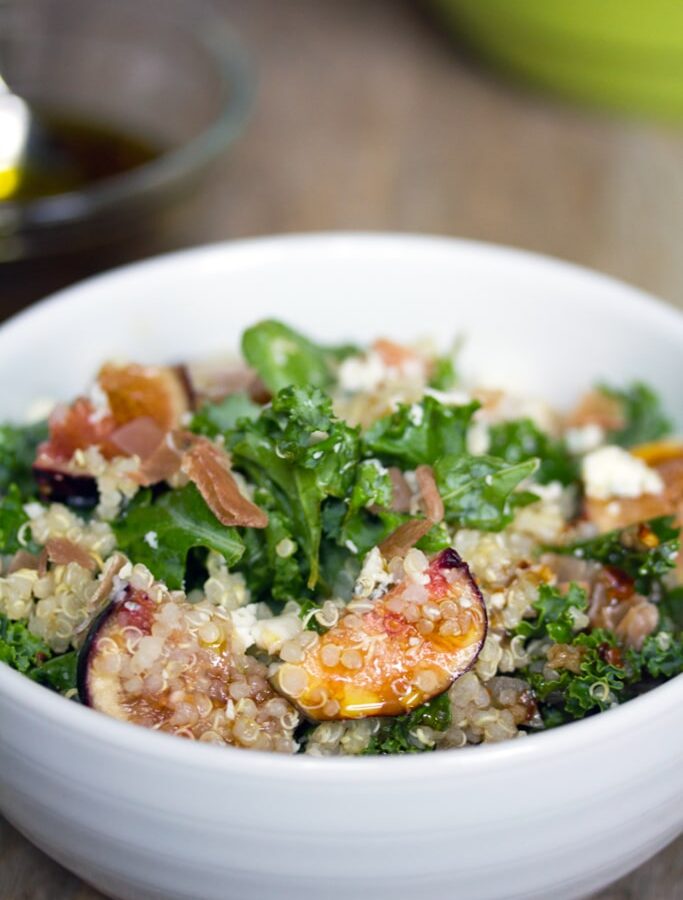 Lemony Kale, Quinoa, and Fig Salad -- This kale fig salad is tossed with prosciutto and gorgonzola and is satisfying enough to be enjoyed as a meal | wearenotmartha.com