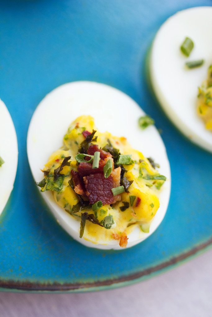 Kale and Bacon Deviled Eggs -- Some of my favorite things in one perfect appetizer | wearenotmartha.com