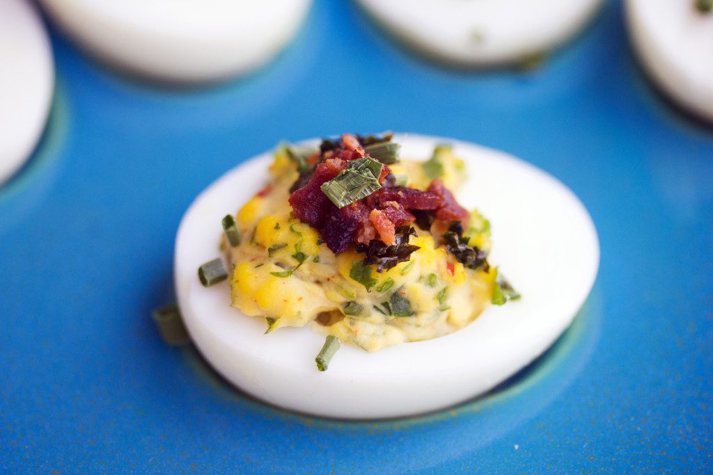 Kale and Bacon Deviled Eggs -- Some of my favorite things in one perfect appetizer | wearenotmartha.com