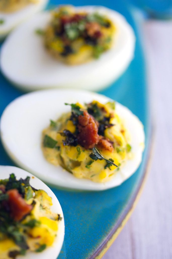 Kale and Bacon Deviled Eggs -- Some of my favorite things in one perfect appetizer | wearenotmartha.com