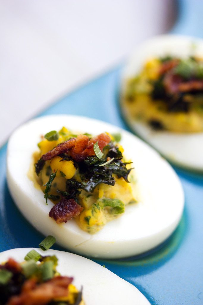 Kale and Bacon Deviled Eggs -- Some of my favorite things in one perfect appetizer | wearenotmartha.com