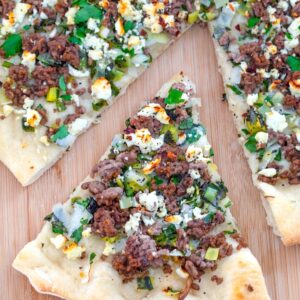 Lamb Mint Flatbread -- This Lamb Flatbread with Mint and Feta is easy to make with simple ingredients, but is filled with lots of delicious spring and summer flavors | wearenotmartha.com