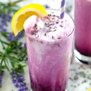 Lavender Lemonade Floats -- Made with lavender simple syrup, lemon sorbet, coconut milk, and soda water, these Lavender Lemonade Floats are both pretty and refreshingly yummy! | wearenotmartha.com