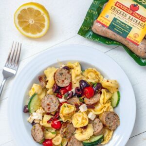 Lemon Tortellini Salad with Chicken Sausage -- This dish is incredibly easy to prepare and heartier than your typical pasta salad. It's perfect for a low-key summer dinner, but also makes an excellent dish to bring to a BBQ or summer party | wearenotmartha.com