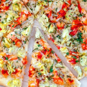 Lobster Artichoke Flatbread -- Lobster is delicious right out of the shell, but this Lobster Artichoke Flatbread will make you realize that lobster is amazing on pizza, too! | wearenotmartha.com