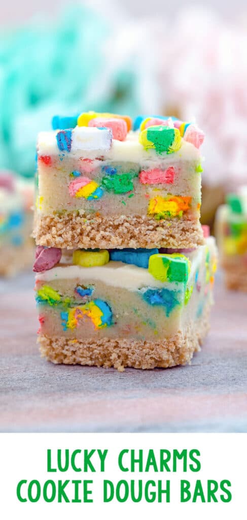 Lucky Charms Cookie Dough Bars -- These Lucky Charms Cookie Dough Bars are a magically delicious dessert consisting of three layers: a sweet and buttery cereal crust, a marshmallow packed cookie dough middle, and a simple buttercream frosting top | wearenotmartha.com #cookiedoughbars #luckycharms #cookiedough #stpatricksday
