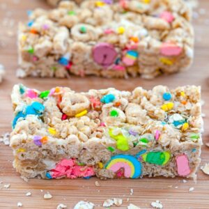Lucky Charms Granola Bars -- Made with Lucky Charms cereal, quick cooking oats, and white chocolate chips, these no-bake Lucky Charms Granola Bars are a fun special treat for your loved ones at St. Patrick's Day and year round! | wearenotmartha.com