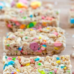Lucky Charms Granola Bars -- Made with Lucky Charms cereal, quick cooking oats, and white chocolate chips, these no-bake Lucky Charms Granola Bars are a fun special treat for your loved ones at St. Patrick's Day and year round! | wearenotmartha.com