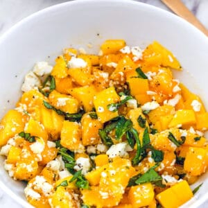 Mango and Feta Salad -- With just four simple ingredients, this Mango and Feta Salad is the stuff your summertime dreams are made of. It's sweet and salty and all things wonderful! | wearenotmartha.com