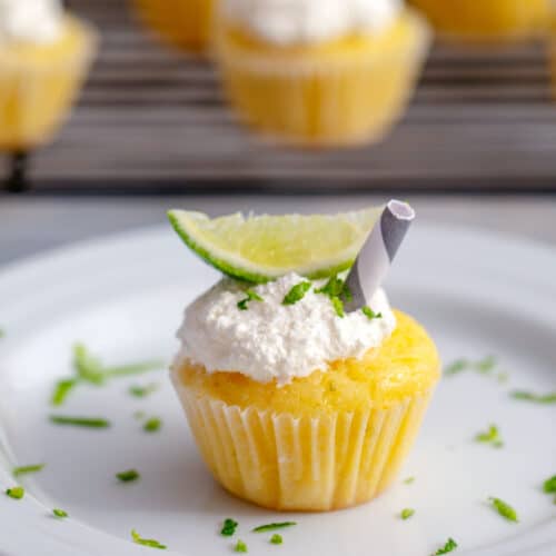 Margarita Cupcakes -- These margarita cupcakes are full of lime flavor... and a little bit of tequila, too! They're easy to make as full-size or mini cupcakes and perfect for summer parties | wearenotmartha.com