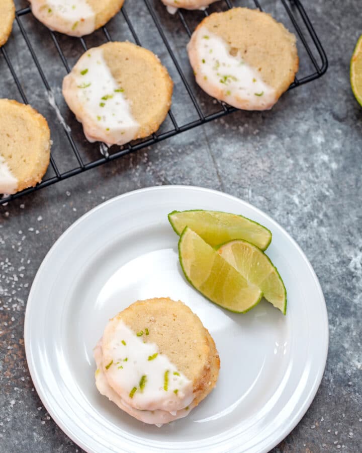 Margarita Shortbread Cookies -- Thanks to orange cointreau in the cookie, tequila in the icing, and plenty of lime juice, these Margarita Cookies taste just like the drink! They're perfect for summertime parties or as happy hour treats | wearenotmartha.com #margaritas #margaritacookies #tequila #summer #cookies