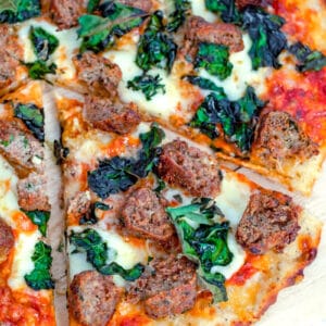 Meatball Flatbread with Parmesan Peppercorn Crust -- What could be better than a pizza topped with meatballs, cheese, and kale? This Meatball Flatbread also has a Parmesan Peppercorn Crust and is the perfect weeknight or weekend dinner! | wearenotmartha.com