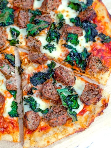 Meatball Flatbread with Parmesan Peppercorn Crust -- What could be better than a pizza topped with meatballs, cheese, and kale? This Meatball Flatbread also has a Parmesan Peppercorn Crust and is the perfect weeknight or weekend dinner! | wearenotmartha.com