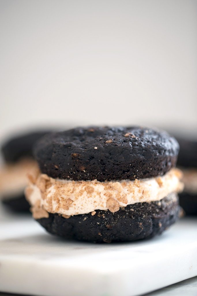 Mexican Chocolate Whoopie Pies with Cinnamon Pebbles -- Whoopie Pies with chocolate, cinnamon, cereal, and marshmallow buttercream | wearenotmartha.com