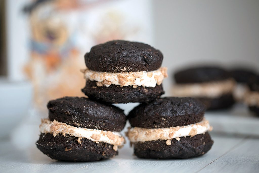 Mexican Chocolate Whoopie Pies with Cinnamon Pebbles -- Whoopie Pies with chocolate, cinnamon, cereal, and marshmallow buttercream | wearenotmartha.com