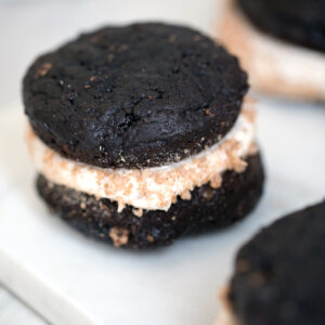 Mexican Chocolate Whoopie Pies with Cinnamon Pebbles -- Whoopie Pies with chocolate, cinnamon, cereal, and marshmallow buttercream | wearenotmartha.com