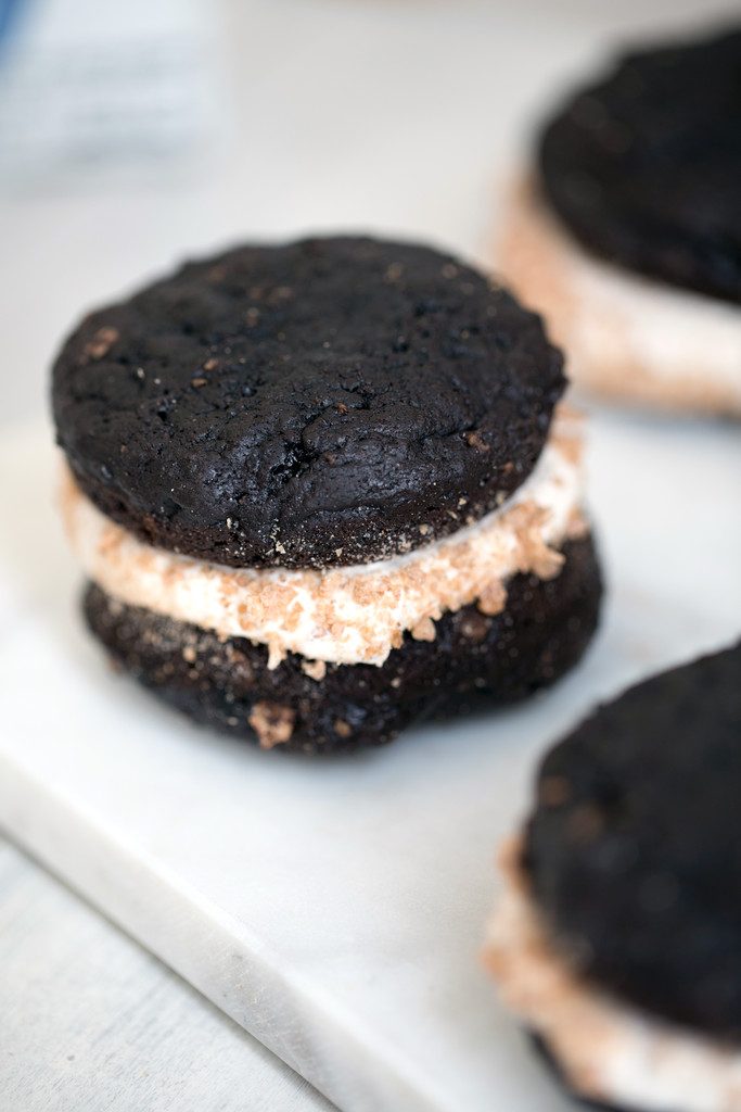 Mexican Chocolate Whoopie Pies with Cinnamon Pebbles -- Whoopie Pies with chocolate, cinnamon, cereal, and marshmallow buttercream | wearenotmartha.com