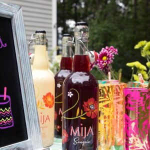 DIY Sangria Bar -- Use Mija Sangria, fresh fruit, and some fun accessories for your own fun summer sangria bar! | wearenotmartha.com