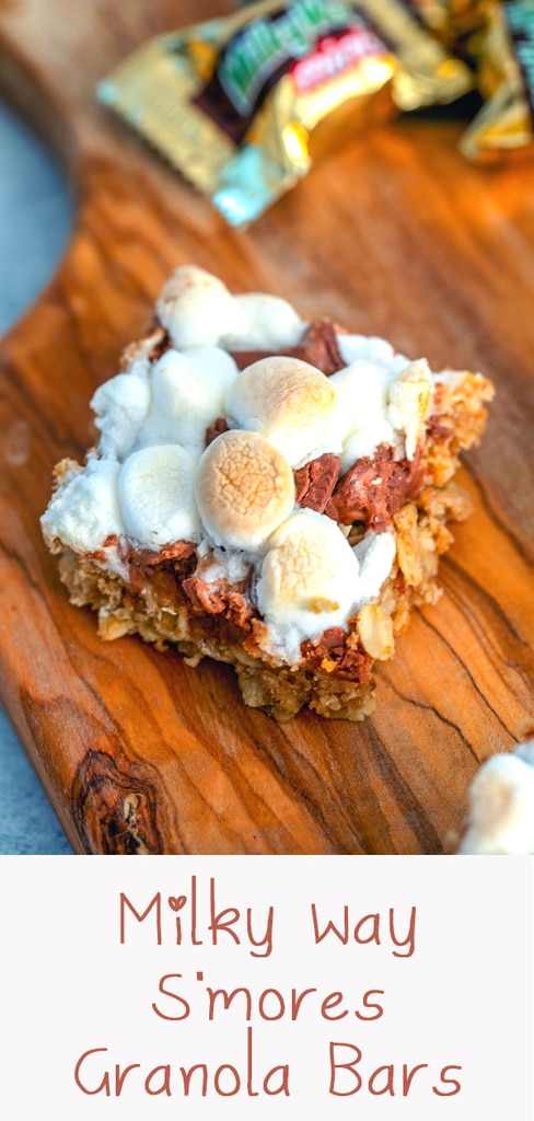 Milky Way S'mores Granola Bars -- There aren't many snacks better than s'mores granola bars... unless you make them Milky Way S'mores Granola Bars instead! Packed with oats, graham cracker crumbles, Milky Way bars, and mini marshmallows, these treats will be loved by kids and adults alike | wearenotmartha.com #granolabars #smores #milkyway #snacks