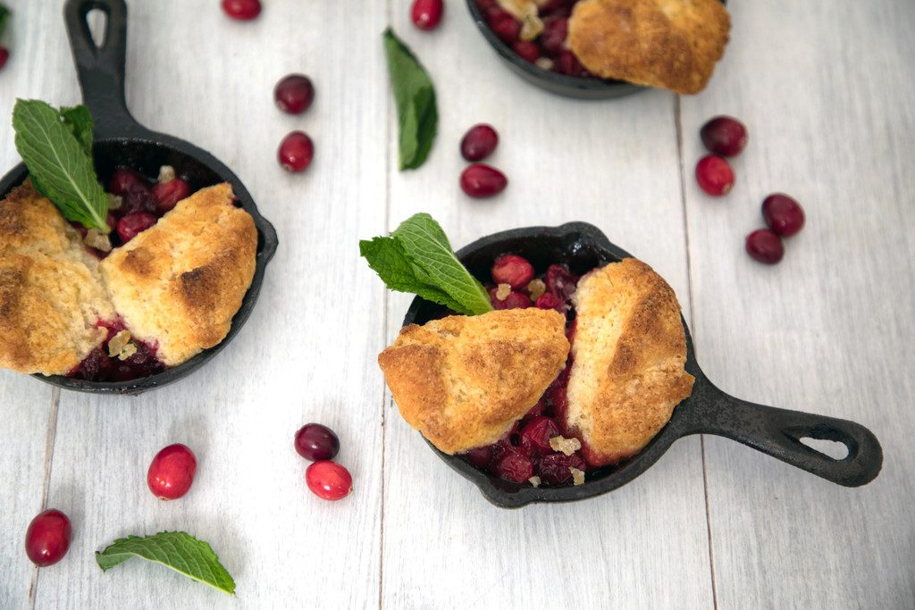 Mini Cranberry Ginger Cobblers -- These cranberry cobblers made in mini skillets are the perfect personal-sized dessert | wearenotmartha.com