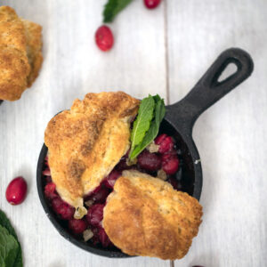Mini Cranberry Ginger Cobblers -- These cranberry cobblers made in mini skillets are the perfect personal-sized dessert | wearenotmartha.com