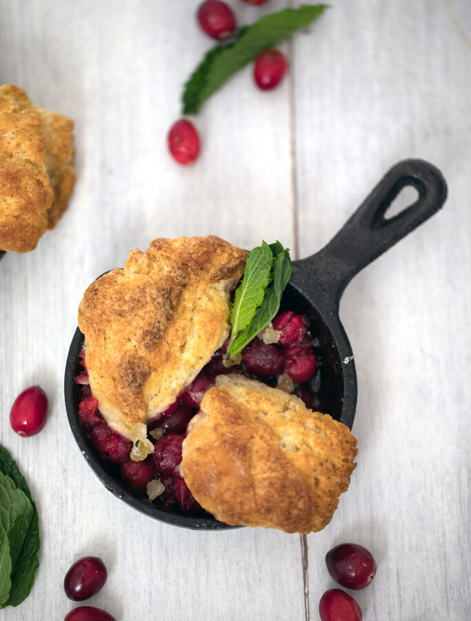 Mini Cranberry Ginger Cobblers -- These cranberry cobblers made in mini skillets are the perfect personal-sized dessert | wearenotmartha.com