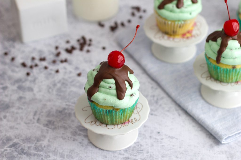 Mint Chocolate Chip Ice Cream Cupcakes -- An ice cream sundae in cupcake form! | wearenotmartha.com