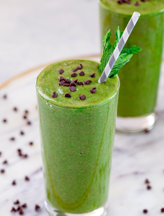Chocolate Mint Green Smoothie -- This Mint Chocolate Green Smoothie is a delicious way to get your vitamins with a little chocolate mint kick. It's perfect for St. Patrick's Day as a healthy Shamrock Shake replacement, but a wonderful addition to your diet any time of year! | wearenotmartha.com