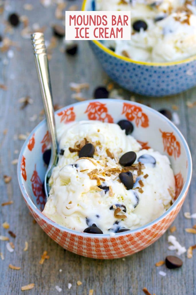 Red bowl of Mounds Bar Ice Cream with dark chocolate chips and toasted coconut with second bowl in the background and recipe title at top