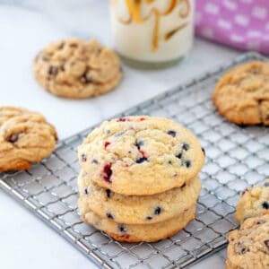 Berry and chocolate chip muffin mix cookies on small wire rack.