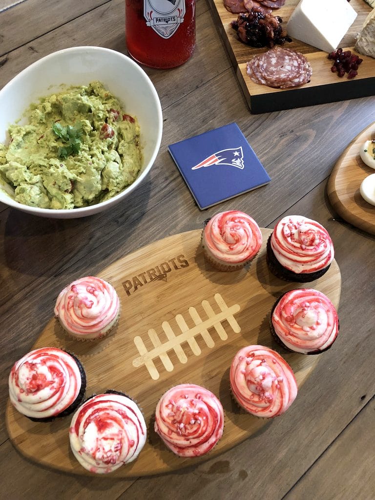 Party food set out on NFL Homegate boards featuring the New England Patriots