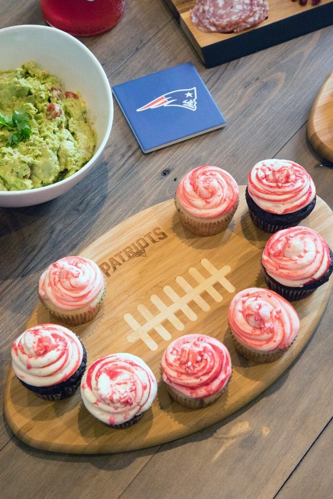 Cupcakes set out on a New England Patriots cutting board from the NFL Homegate collection