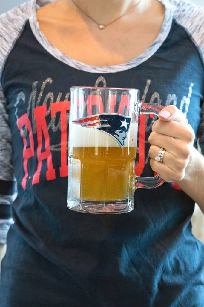 Beer poured into a New England Patriots beer mug from the NFL Homegate collection