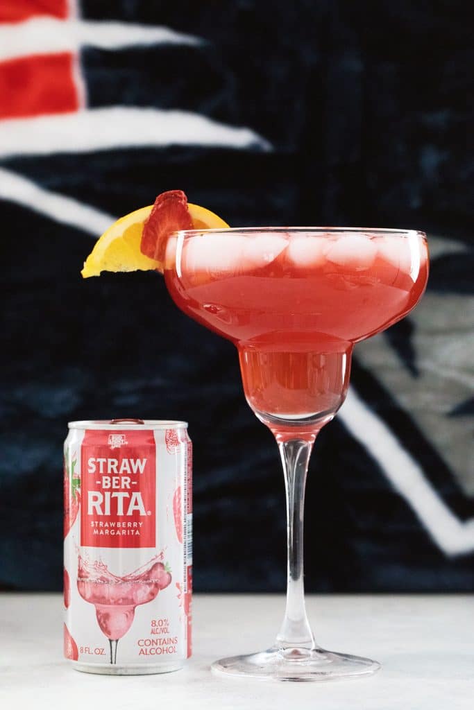 Strawberry Margarita Sangria featuring Straw-Ber-Rita poured in a margarita glass