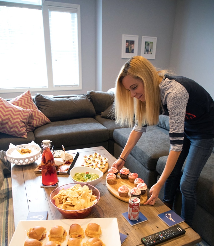 Sues setting out food for her NFL Homegate party