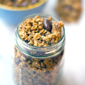 Peanut Butter Quinoa Chia Granola -- This tasty Peanut Butter Quinoa Chia Granola is the perfect mix of sweet and healthy. Peanut butter and chocolate-covered raisins are balanced out by a nutritious mix of oats, quinoa, and chia seeds | wearenotmartha.com