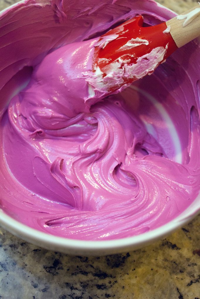 Overhead view of bright pink royal icing